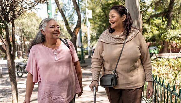 Two women walking together