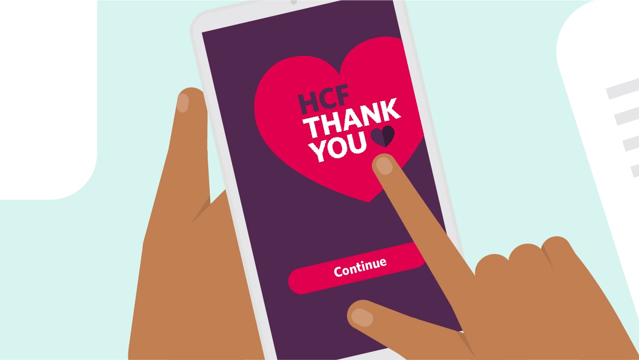 Illustration of a phone held by someone with the HCF Thank You app on screen.