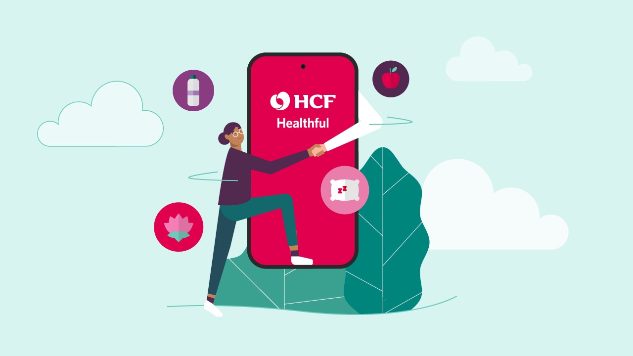 An illustration of a person standing next to a giant phone with the HCF healthful app display on it.